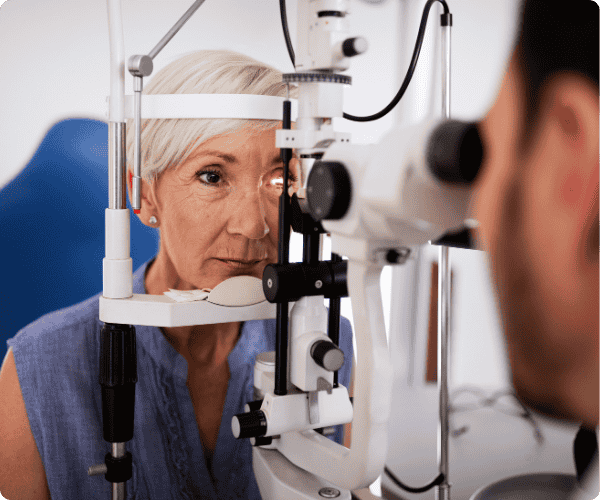ophthalmologist performing an exam on a patient
